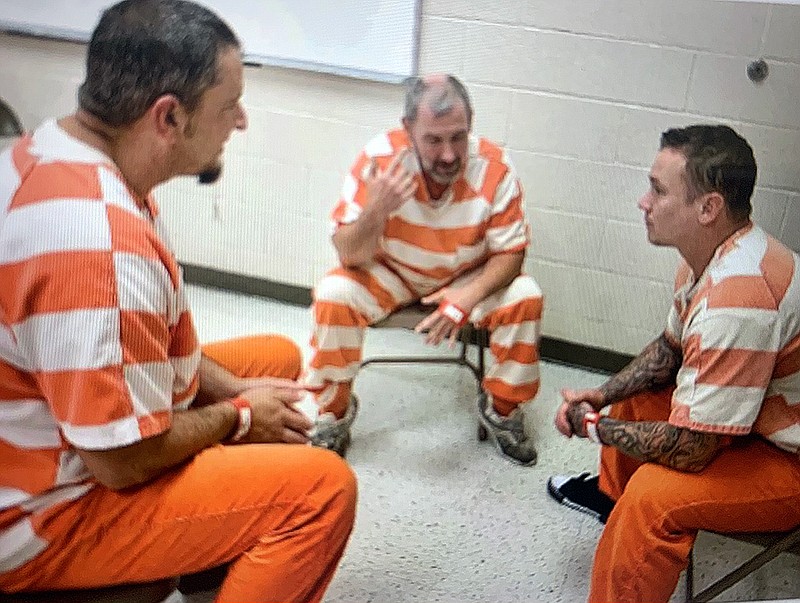In this file photo, inmates Scottie Flournoy and Jeffrey James talk to Matthew Van Horn about the Sevier County Sheriff's Office Residential Substance Abuse Treatment program in 2019. The program is being featured in a series on streaming channel Discovery Plus that will be available at the end of August.