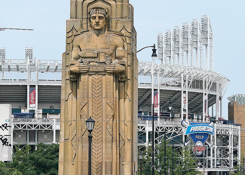 A guardian rests on the Hope Memorial Bridge within site of Progressive Field on Friday in Cleveland. Cleveland's new nickname, the Guardians, was inspired by two large landmark stone edifices near the downtown ballpark, referred to as traffic guardians, on the Hope Memorial Bridge over the Cuyahoga River.