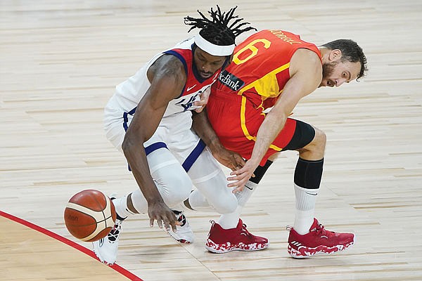 Jerami Grant of the United States and Spain's Sergio Rodriguez battle for the ball during the second half of an exhibition game last week in Las Vegas.