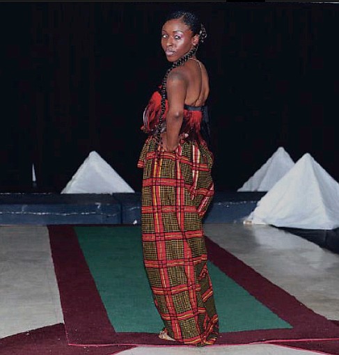 Rue, as she's known on stage, poses at the end of the runway Saturday, July 24, 2021, during Soulfest organized by Building Community Bridges in Jefferson City.