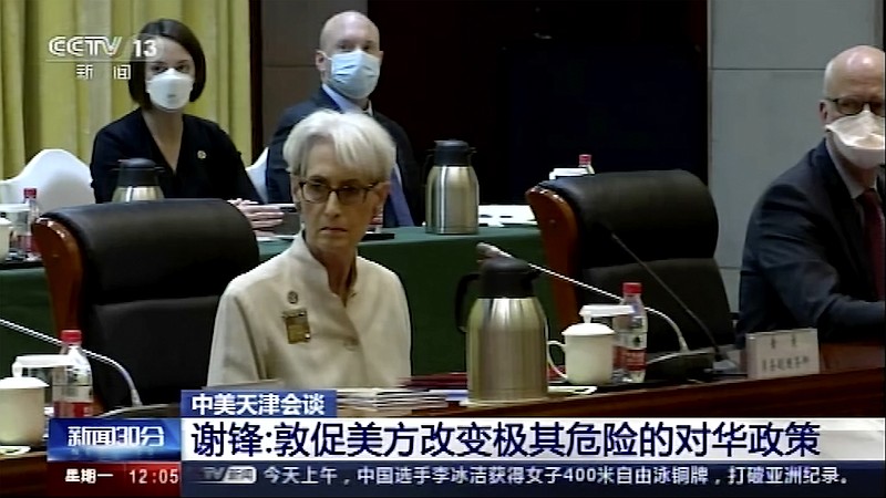 In this image taken from a video footage run by China's CCTV via AP Video, U.S. Deputy Secretary of State Wendy Sherman, front left, and her delegation meet Chinese counterpart in Tianjin, China Monday, July 26, 2021. China blamed the U.S. for what it called a “stalemate” in bilateral relations as high-level face-to-face talks began Monday. (CCTV via AP Video)