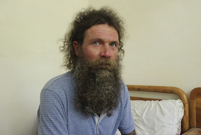 Austrian climber Stephen Keck, one of two mountain climbers who survived an avalanche and were subsequently rescued, gives an interview to The Associated Press, in Skardu, a town in the Gilgit Baltistan region of northern Pakistan, Monday, July 26, 2021.  A third climber, Rick Allen, a renowned Scottish climber died in the avalanche while attempting to scale K2 in northern Pakistan, the world's second-highest mountain peak, a Pakistani mountaineering official and the U.K.-based charity Partners Relief & Development said Monday. (AP Photo/M.H. Balti)