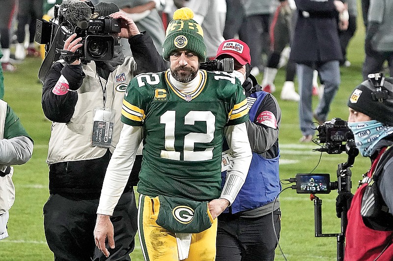In this Jan. 24 file photo, Packers quarterback Aaron Rodgers walks off the field after the NFC Championship Game against the Buccaneers in Green Bay, Wis.
