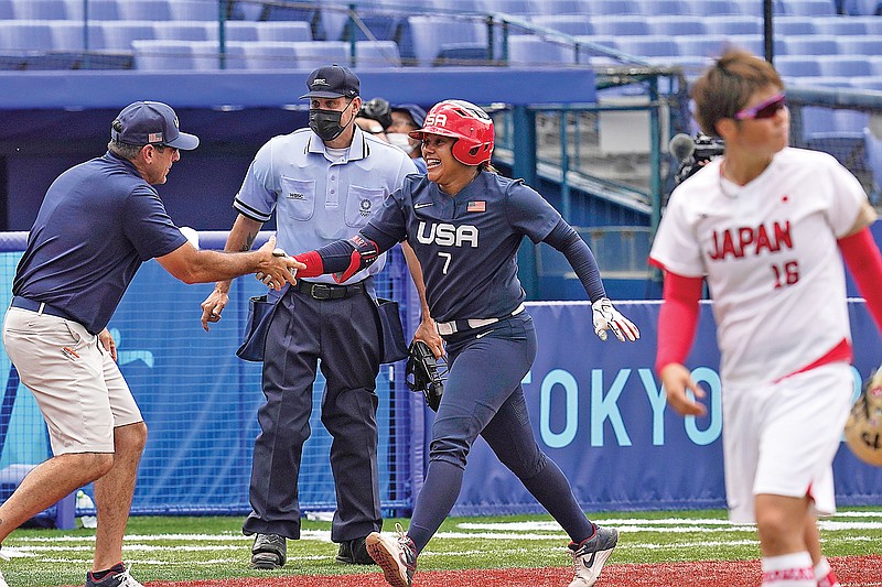 Kelsey Stewart of the United States celebrates her game-winning home run against Japan in the seventh inning of Monday's game at the 2020 Summer Olympics in Yokohama, Japan.