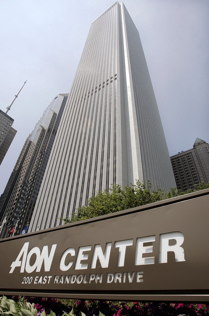 FILE - In this Aug. 2, 2005, file photo, Aon Center in downtown Chicago is shown. Shares of Aon are climbing for a second day after agreeing with Willis Towers Watson to call off a $30 billion buyout that would have created the largest insurance broker in the world. Last month, the Justice Department sued to block the all-stock deal, saying that it could eliminate competition, raise prices and hamper innovation.  (AP Photo/Charles Rex Arbogast, File)