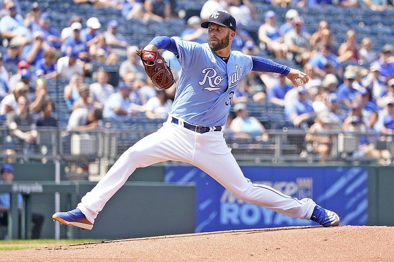 Danny Duffy of the Royals throws to the plate during a game against the Twins earlier this month at Kauffman Stadium.