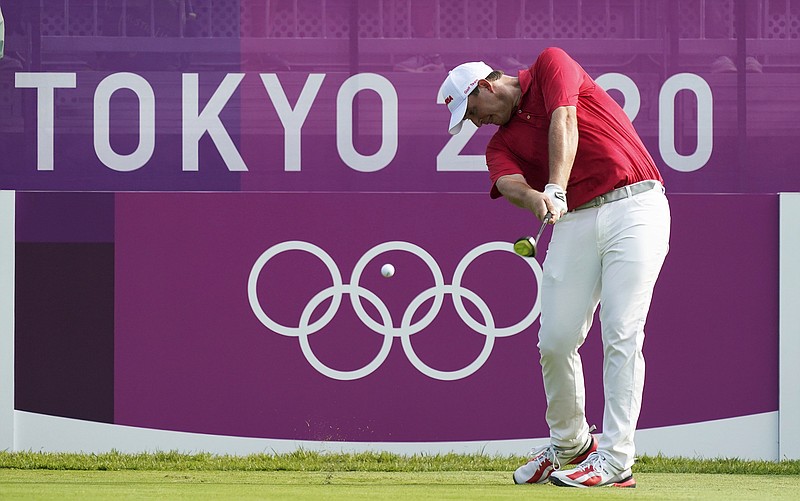 Austria's Sepp Straka hits a tee shot on the first hole during Thursday's first round of the men's golf event at the 2020 Summer Olympics at the Kasumigaseki Country Club in Kawagoe, Japan.