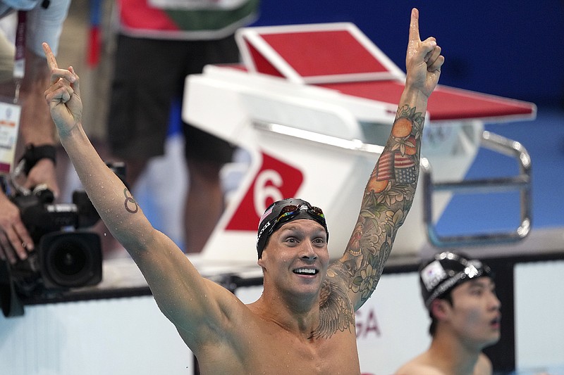 Caeleb Dressel of the United States celebrates winning the men's 100-meter freestyle final Thursdays at the 2020 Summer Olympics in Tokyo.