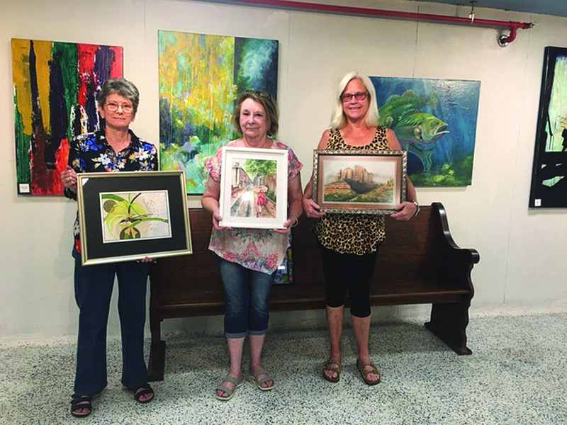 These members were deemed Artists of the Month at the Four States Regional Art Club meeting in July. From left, first place Carla Myane, second place Debbie James and third place Tammy Glenn.