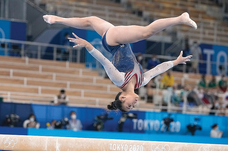 Sunisa Lee performs on the balance beam during the women's gymnastics all-around final Thursday at the 2020 Summer Olympics in Tokyo.