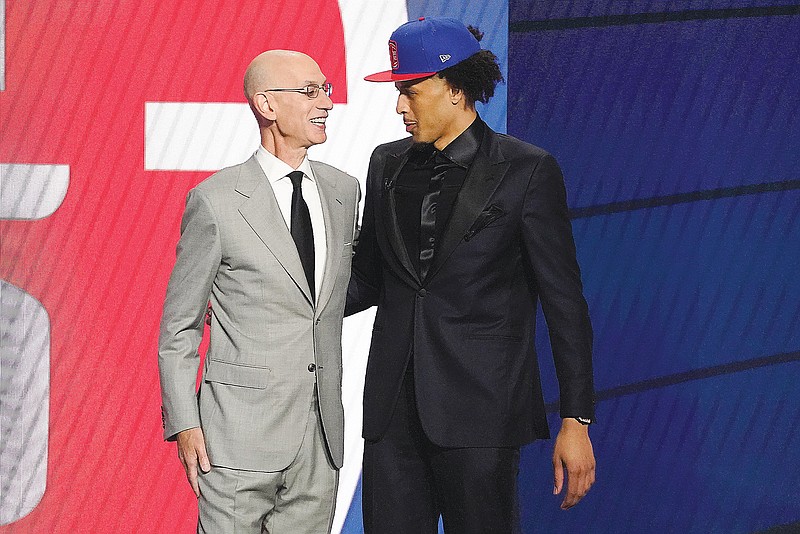 NBA commissioner Adam Silver greets Cade Cunningham after he was selected No. 1 overall by the Pistons in the NBA draft Thursday night in New York.