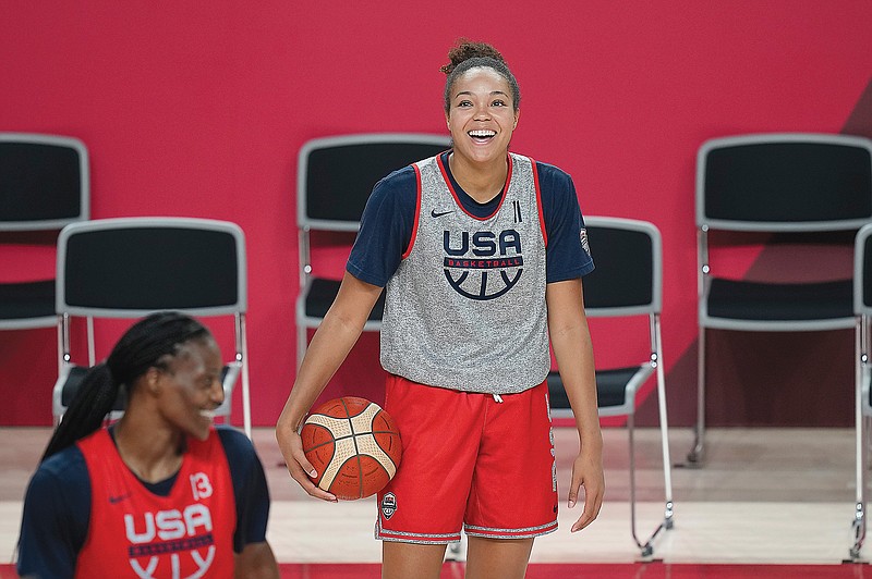 Napheesa Collier shares a laugh with teammates during practice last Saturday at the 2020 Summer Olympics in Saitama, Japan.