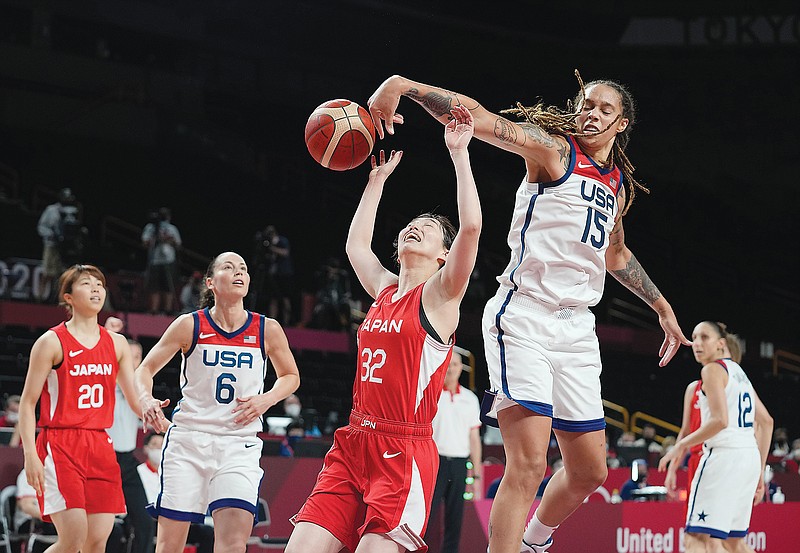 Japan's Saori Miyazaki has her shot blocked by Brittney Griner of the Unites States during Friday's game at the 2020 Summer Olympics in Saitama, Japan.