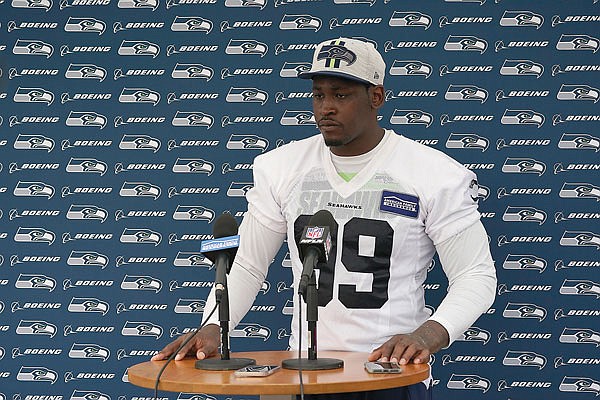 Seahawks defensive end Aldon Smith talks to reporters after practice Saturday in Renton, Wash.