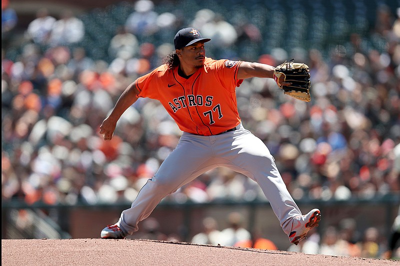 Houston Astros' Luis Garcia throws against the San Francisco Giants during the first inning of a baseball game in San Francisco, Sunday, Aug. 1, 2021. (AP Photo/Jed Jacobsohn)