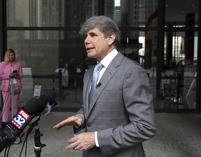 Former Illinois Gov. Rod Blagojevich holds a news conference outside a federal courthouse in Chicago on Monday, Aug. 2, 2021. Blagojevich sued his home state Monday for booting him from the governor’s seat after his 2008 arrest for corruption and stripping him of his right to run for elective office in Illinois. Before filing the lawsuit, an unapologetic Blagojevich addressed reporters outside the same federal courthouse in Chicago where he was convicted, declaring: “I’m back.” He said he hasn’t decided, however, if he will seek to run for anything if he succeeds in eliminating the legal hurdles to doing so. (Terrence Antonio James/Chicago Tribune via AP)