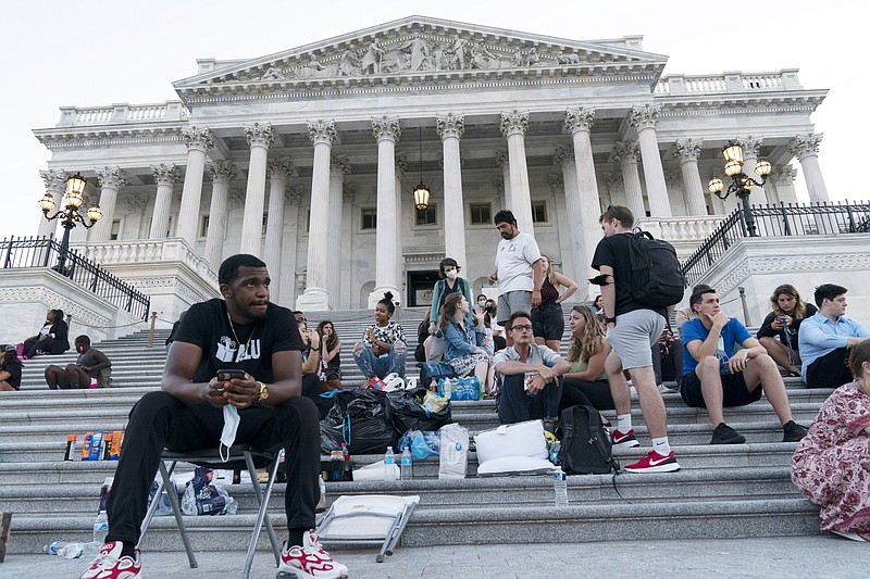 Supporters of Rep. Cori Bush, D-Mo., camp with her outside the U.S. Capitol, in Washington, Monday, Aug. 2, 2021, as anger and frustration has mounted in Congress after a nationwide eviction moratorium expired at midnight Saturday. (AP Photo/Jose Luis Magana)