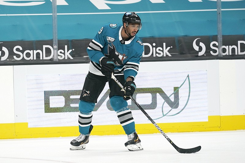 In this March 1 file photo, Sharks left wing Evander Kane controls the puck during a game against the Avalanche in San Jose, Calif,