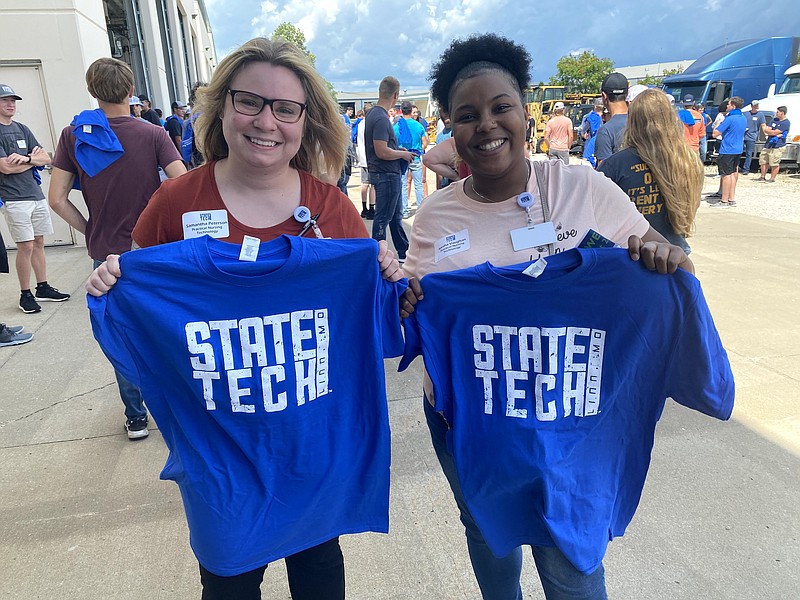 <p>Courtesy/Brandon McElwain</p><p>Samantha Peterson, left, and Leesha Vaughan, both practical nursing students, pose Tuesday with State Tech shirts.</p>