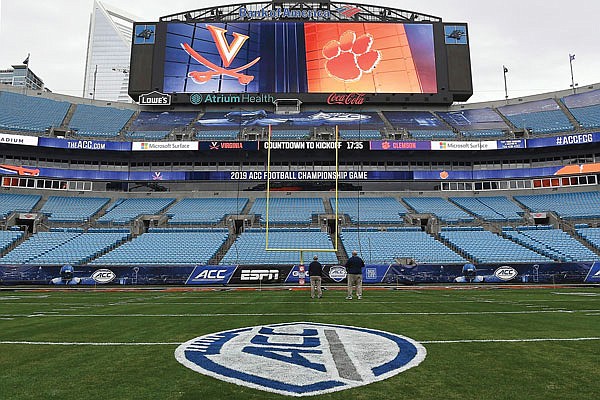 In this Dec. 6, 2019, file photo, the ACC Championship logo is displayed on the field before a game at Bank of America Stadium in Charlotte, N.C.