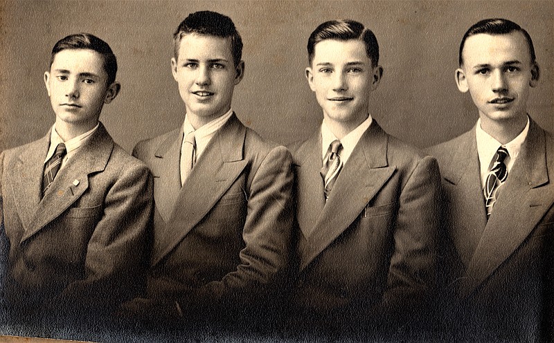 <p>Courtesy of Norris Siebert</p><p>Surprise School was located a few miles north of Russellville on Route K. Pictured is the eighth-grade graduating class in the spring of 1949. From left: Donald Maples, Roger Kirchoff, Norris Siebert and their teacher, Donald Wyss.</p>