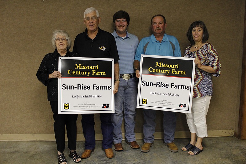 <p>Democrat photo/Austin Hornbostel</p><p>Members of the family were on hand as Tipton’s Sun-Rise Farm was recognized for its Century Farm designation Monday night in Stover. Judy Rowles, Robert Rowles, Mitchell Moon, Billy Joe Moon and Sheila Moon are pictured.</p>
