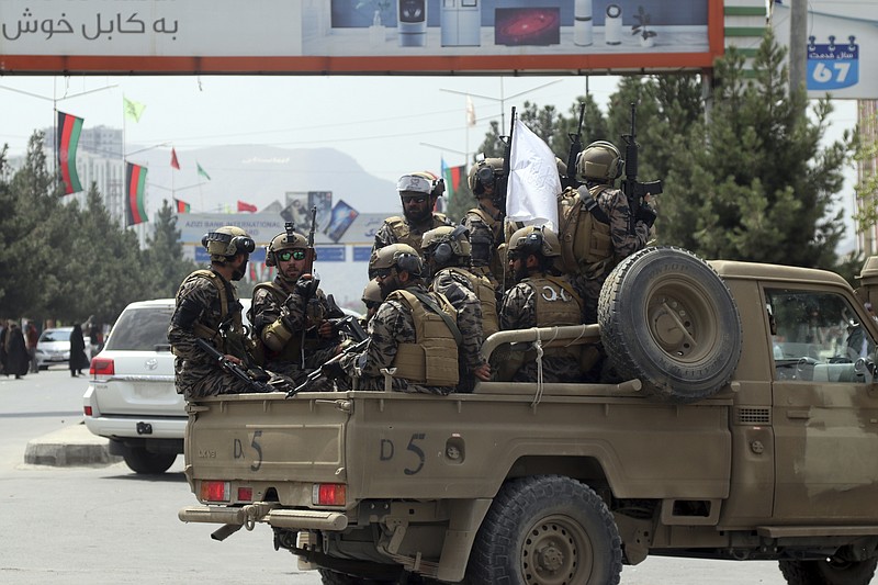 <p>Taliban special force fighters arrive inside the Hamid Karzai International Airport after the U.S. military’s withdrawal, in Kabul, Afghanistan, Tuesday, Aug. 31, 2021. The Taliban were in full control of Kabul’s international airport on Tuesday, after the last U.S. plane left its runway, marking the end of America’s longest war. (AP Photo/Khwaja Tawfiq Sediqi)</p>