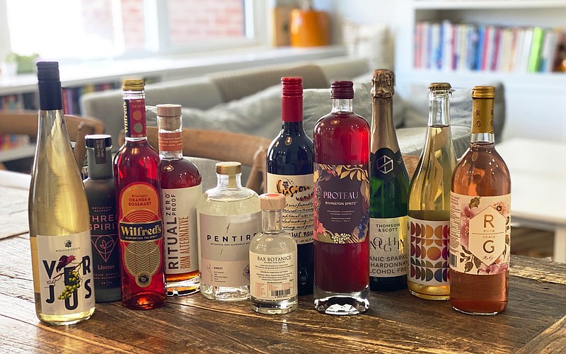 Non-alcoholic spirits are displayed in New York in August 2021. Interest in a sober lifestyle has been growing for years, leading to the rise of mocktails and alcohol-free bars. The pandemic led even more people to question boozy drinking habits. Non-alcoholic options range from drinks that aim to replicate existing spirits to ones that promise something completely new. (Katie Workman via AP)