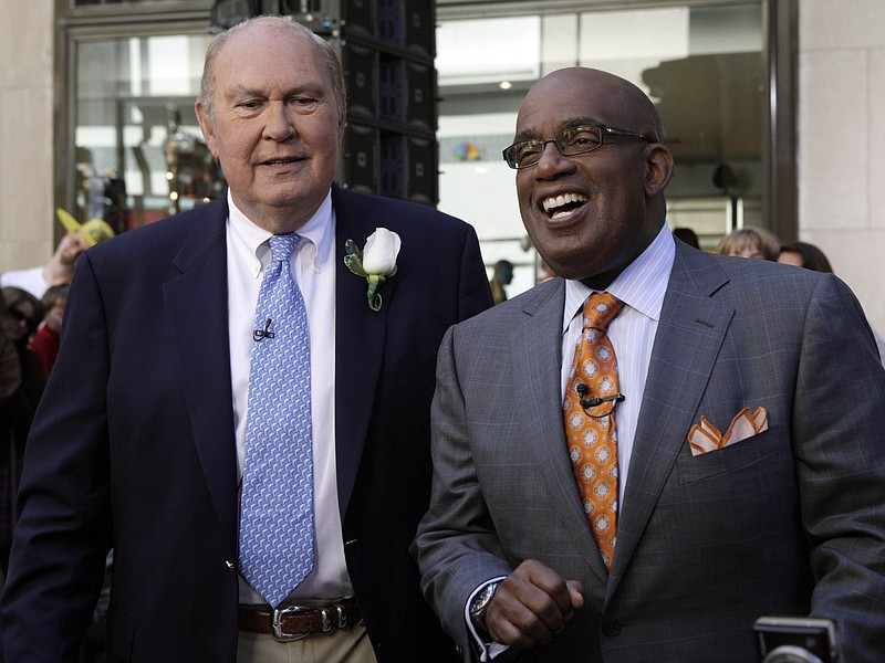 In this Tuesday, July 14, 2009, file photo, Willard Scott, left, and Al Roker, weathercasters on the NBC "Today" television program, appear on the show in New York, Scott, the beloved weatherman who charmed viewers of NBC's "Today" show with his self-deprecating humor and cheerful personality, has died at age 87.  Roker, his successor on the morning news show, announced that Scott died peacefully Saturday morning, Sept. 4, 2021, surrounded by family. (AP Photo/Richard Drew, File)