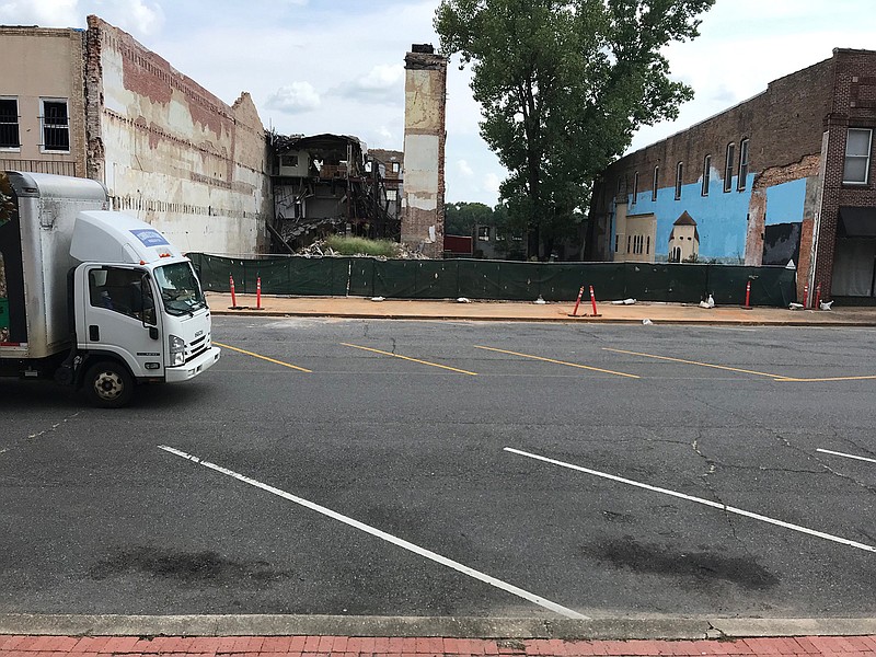 The former Regency House building in the 100 block of East Broad Street is now a mostly stalled demolition site. Last week, the sidewalk in front of it was cleared off.
