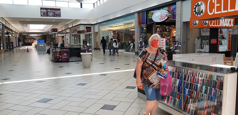  Brenda Carper of Fouke, Arkansas, enjoys an afternoon stroll in Texarkana's Central Mall. Ambitious walkers can start as early as 7 a.m.