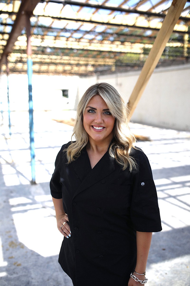 Chef and business owner Marjorie Slimer stands at the scene of her future restaurant, Franklin's Kitchen + Catering, which will be on Texas Boulevard.
