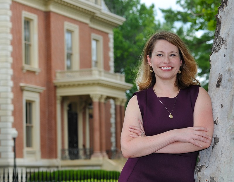 Julie Smith/News Tribune
With the Missouri Governor's Mansion as a backdrop, Rebecca Gordon, executive director of Friends of the Missouri Governor's Mansion, poses for a portrait.