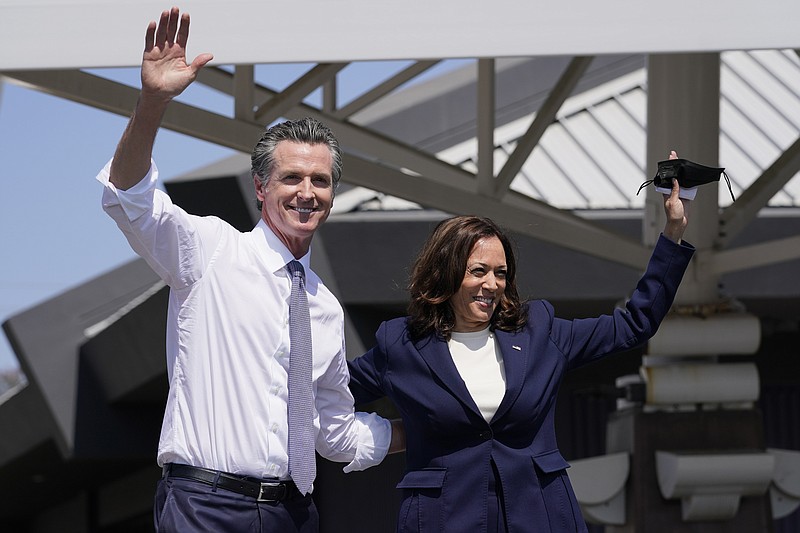 <p>California Gov. Gavin Newsom and Vice President Kamala Harris wave during a campaign event at the IBEW-NECA Joint Apprenticeship Training Center in San Leandro, Calif., Wednesday, Sept. 8, 2021. (AP Photo/Carolyn Kaster)</p>