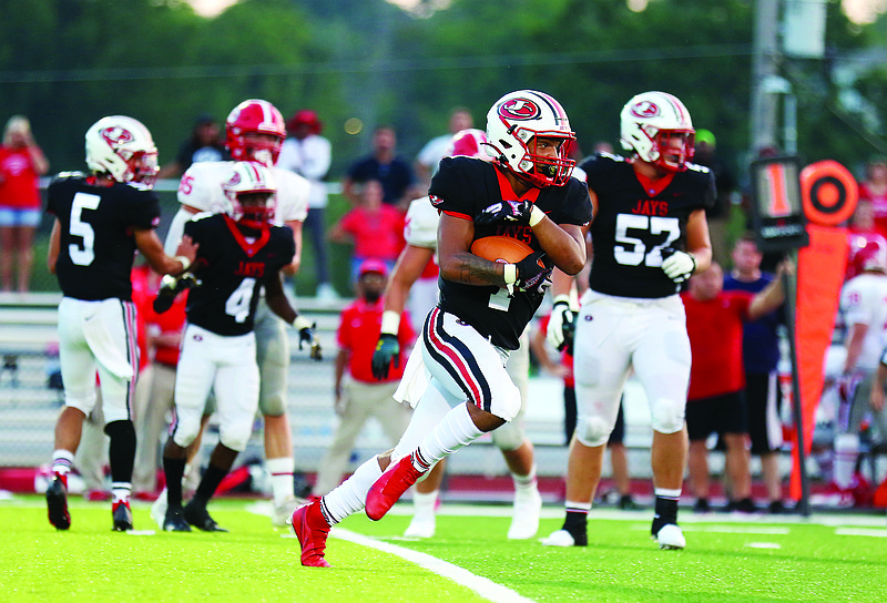 Jefferson City running back Zane Wings finds space to run during the season opener against Chaminade at Adkins Stadium.