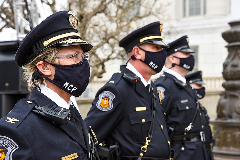 Julie Smith/News Tribune
Chief of Missouri Capitol Police Zim Schwartze, near, and fellow police stand at the ready during Inauguration ceremonies at Missouri’s Capitol Monday, Jan. 11, 2021.