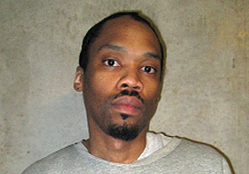 FILE - This Feb. 5, 2018, file photo provided by the Oklahoma Department of Corrections shows Julius Jones. Oklahoma's Supreme Court has agreed to hear a prosecutor's request that two members of the state's Pardon and Parole Board should not be allowed to vote on a high-profile death row inmate's commutation hearing. District Attorney David Prater wants the high court to prevent board members Adam Luck and Kelly Doyle from deciding the fate of death row inmate Julius Jones. (Oklahoma Department of Corrections via AP, File)