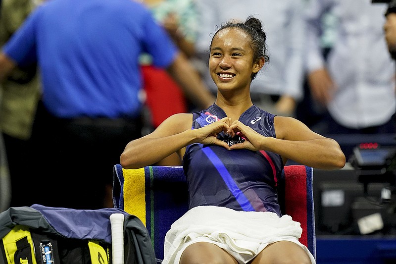 Leylah Fernandez molds her hands in the shape of a heart after defeating Aryna Sabalenka during Thursday's semifinals of the US Open in New York.