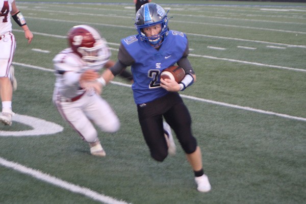 Junior running back Trevor Wilson runs the ball around the Louisiana defense. South Callaway ran the ball on most of its plays and scored five times on the ground.
