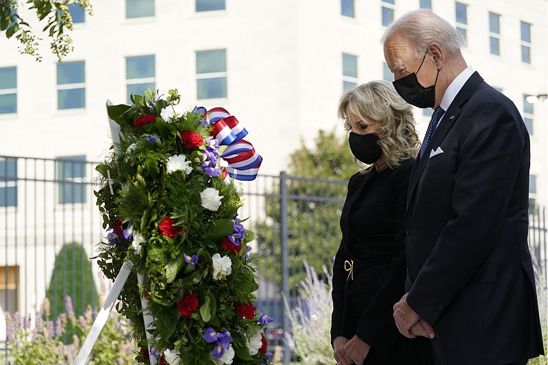 <p>AP</p><p>President Joe Biden and first lady Jill Biden participate in a wreath ceremony on the 20th anniversary of the terrorist attacks at the Pentagon Saturday in Washington, standing at the National 9/11 Pentagon Memorial site, which commemorates the lives lost at the Pentagon and onboard American Airlines Flight 77.</p>