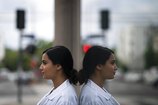 Rose Kaur Sodhi, a medical resident at Cedars-Sinai Medical Center, stands for a portrait Wednesday, Aug. 18, 2021, in Los Angeles. Rose, Balbir Singh Sodhi’s niece, was a second grader getting ready for a relative’s birthday party when her family learned of her uncle’s murder. “We knew something was terribly wrong because my dad came home crying. I had never seen that before,” she said of her father and Balbir’s brother, Rana Singh Sodhi, who became a well-known figure in the Sikh American community and taught her to share her family’s story and advocate for peace. (AP Photo/Jae C. Hong)