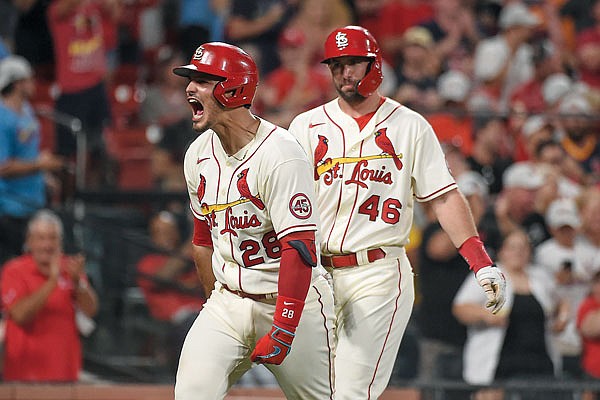Nolan Arenado of the Cardinals celebrates after hitting a home run in the eighth inning of Saturday night's game against the Reds at Busch Stadium.