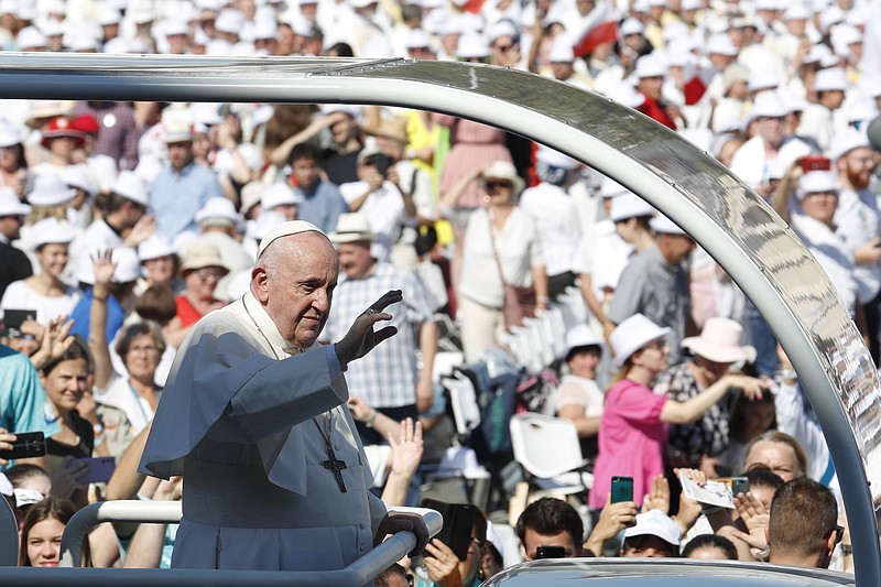 Pope Francis arrives to celebrate a mass for the closing of the International Eucharistic Congress, at Budapest's Heroes Square, Sunday, Sept. 12, 2021. Francis is opening his first foreign trip since undergoing major intestinal surgery in July, embarking on an intense, four-day, two-nation trip to Hungary and Slovakia that he has admitted might be overdoing it. (AP Photo/Laszlo Balogh)