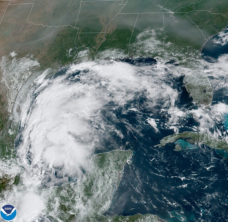 This satellite image provided by NOAA shows Tropical Storm Nicholas in the Gulf of Mexico on Sunday, Sept. 12, 2021. Tropical storm warnings have been issued for coastal Texas and the northeast coast of Mexico. Nicholas is expected to produce storm total rainfall of 5 to 10 inches, with isolated maximum amounts of 15 inches, across portions of coastal Texas into southwest Louisiana Sunday, Sept. 12 through midweek.  (NOAA via AP)