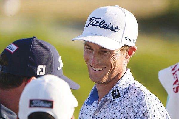 In this May 20 file photo, Will Zalatoris smiles as he walks off the green on the 16th hole during the first round of the PGA Championship in Kiawah Island, S.C.