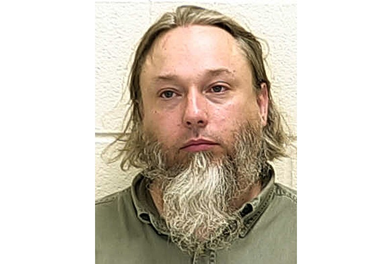 FILE - This undated file photo provided by The Ford County Sheriff's Office in Paxton, Ill., shows Michael Hari, a militia leader convicted of master­minding the bombing of a Minnesota mosque, Hari is now known by her transgender identity, Emily Claire Hari. Hari, the leader of an Illinois anti-government militia group who authorities say masterminded the 2017 bombing of a Minnesota mosque is to be sentenced Monday, Sept. 13, 2021. Emily Claire Hari, who was previously known as Michael Hari and recently said she is transgender, faces a mandatory minimum of 30 years in prison for the attack on Dar al-Farooq Islamic Center. (Ford County Sheriff's Office via AP File)
