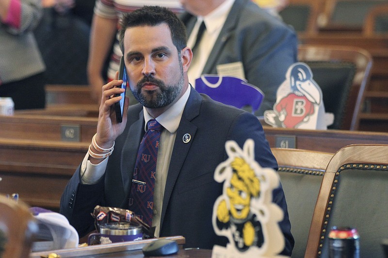 <p>AP File</p><p>Kansas state Rep. Mark Samsel, R-Wellsville, talks on a cellphone ahead of the House’s daily session at the Statehouse in Topeka, Kansas. Samsel, accused of kicking a high school student in the testicles pleaded guilty Monday to three lesser misdemeanor charges of disorderly conduct and was placed on a year’s probation under an deal with the local prosecutor.</p>