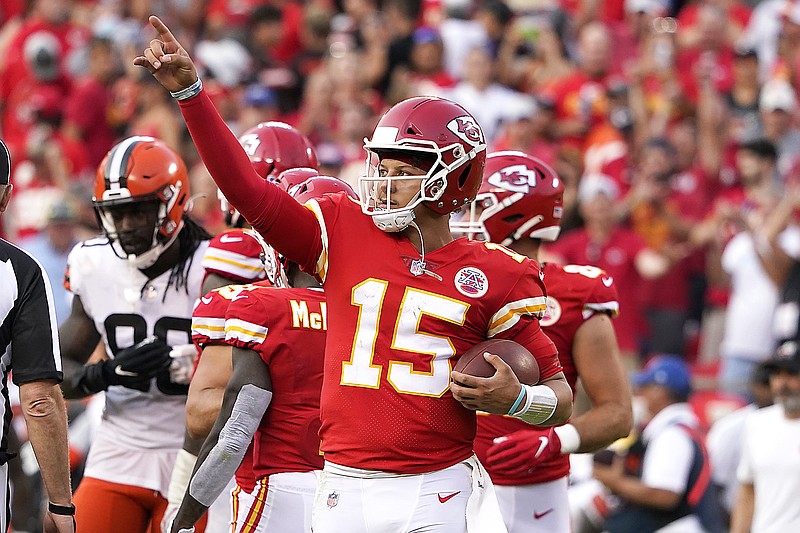 Chiefs quarterback Patrick Mahomes celebrates Sunday after the final whistle in a 33-29 victory against the Browns at Arrowhead Stadium.