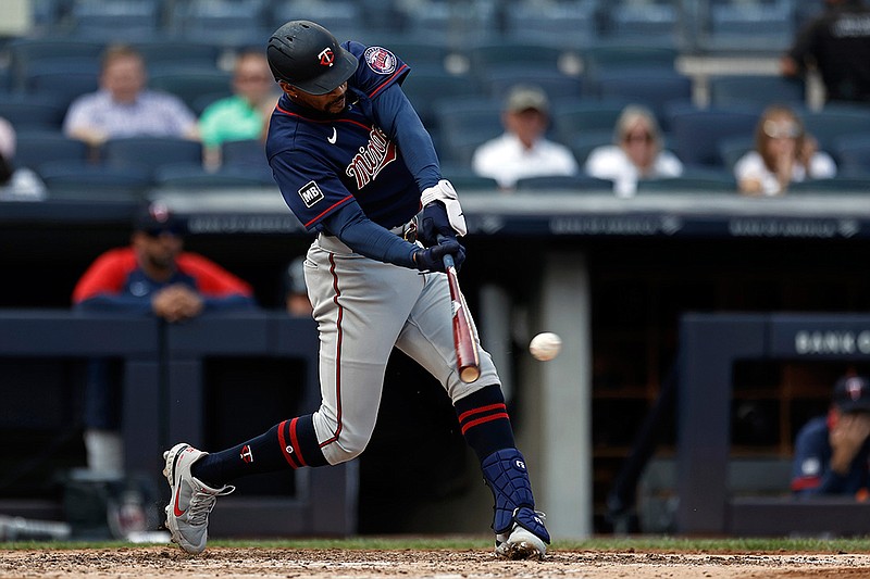 Minnesota Twins' Byron Buxton hits a single against the New York Yankees during the fifth inning of a baseball game on Monday, Sept. 13, 2021, in New York. (AP Photo/Adam Hunger)