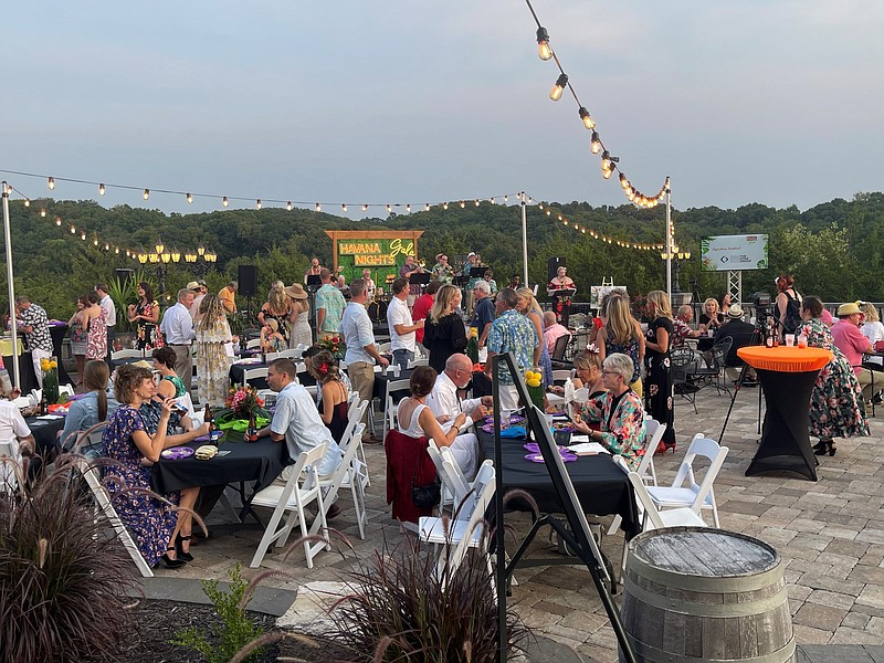 <p>Attendees enjoy the Jefferson City Area Chamber of Commerce’s annual gala Friday at Canterbury Hill Winery. The event had a Havana Nights theme and recognized three community members with awards. Photo provided by the Jefferson City Area Chamber of Commerce</p>